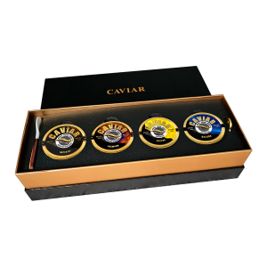 Caviar tasting set in a black and gold gift box: four tins — Imperial, Premium, Osetra and Beluga — with a mother-of-pearl spoon