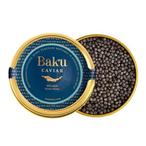 Baku Caviar Beluga tin beside an open tin of glossy Huso huso beluga caviar