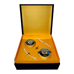 Beluga and Imperial caviar set — two tins with two mother-of-pearl spoons and a caviar opener in a black and gold gift box